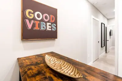 a sculpture of a feather sitting on a table in a museum at Elegant Miami Apartment East Little Havana / Free Parking in Miami