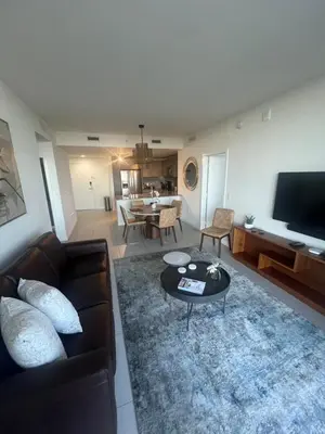a living room with a couch and a table at APARTMENT FOR RENT 2 BED 2 BATH 1 Parking DOWNTOWN DORAL in Miami