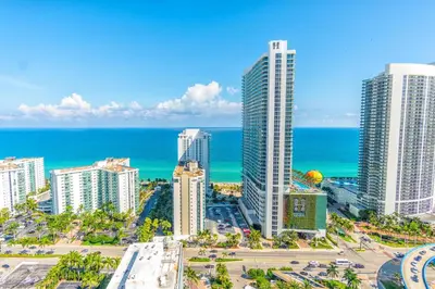 a view of a city with skyscrapers and the ocean at Hyde Beach House 2601 in Hollywood
