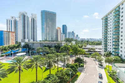 a city skyline with palm trees and buildings at Ocean Reserve 725 in Miami Beach