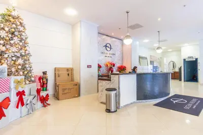 a store lobby with a christmas tree and a counter at Ocean Reserve 1515 in Miami Beach
