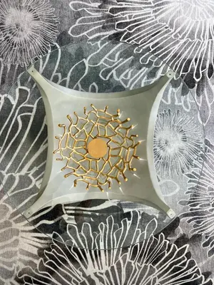 a comb sitting on top of a table with flowers at WOW! Best Location! Best Unit! New Renovated South Beach Ocean Front in Miami Beach
