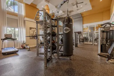 a gym with a punching bag hanging from the ceiling at Doral 1BR w wd pool gym nr Airport MIA-17 in Miami