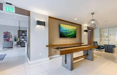 a lobby with a pool table in a store at Doral 1BR w wd pool gym nr Airport MIA-17 in Miami