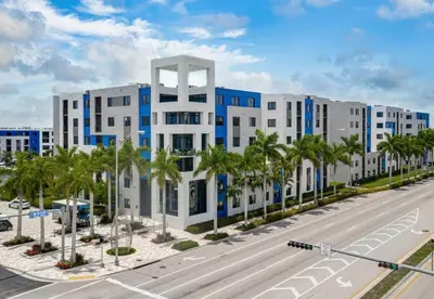 an image of an apartment building on a street at Doral 1BR w wd pool gym nr Airport MIA-17 in Miami