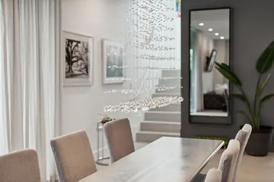 a dining room with a table and chairs and a mirror at City Forest One,Brand New Living, Executive /1Gb/s in Miami