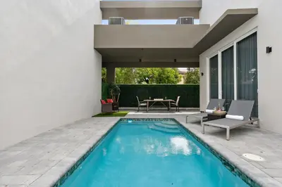 a swimming pool in the backyard of a house at City Forest One,Brand New Living, Executive /1Gb/s in Miami