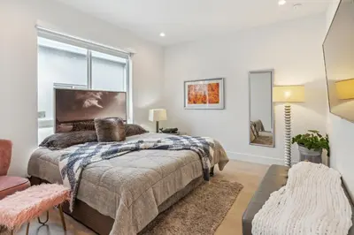 a bedroom with a bed and a window at City Forest One,Brand New Living, Executive /1Gb/s in Miami