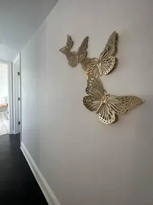 a wall decoration of butterflies on a wall at Ft Lauderdale Jewel in Fort Lauderdale