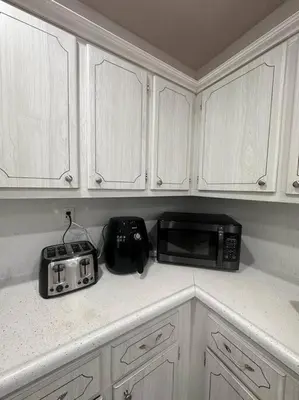 a kitchen counter with a microwave and a toaster at Ft Lauderdale Jewel in Fort Lauderdale
