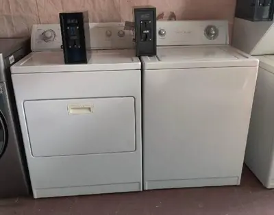 two washing machines sitting next to each other at Private Rooms close to Miami Airport - Free parking - 02 in Miami