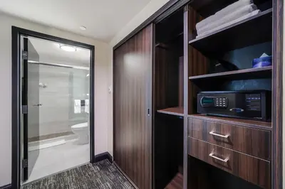 a bathroom with a toilet and a microwave at Venezia Hotel By At Mine Hospitality in Miami Beach