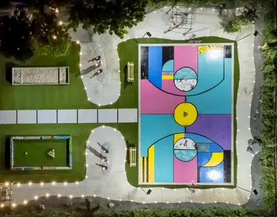 an overhead view of a park with a playground at Mega Fun Villa Northwest Miami BY THE GLAMHOMES in Miami