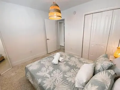 a living room with a couch with pillows on it at Cozy Apartment Near Brickell in Miami