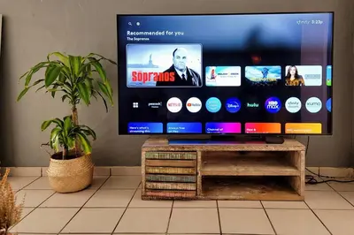 a flat screen tv sitting on top of a table at Tropical Charm Little Havana Calle Ocho 3 in Miami