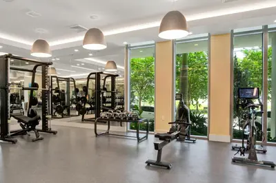 a gym with treadmills and elliptical machines at Little Havana 1br w pool gym near restaurants MIA-48 in Miami