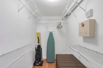 a room with white walls and white shelves at Fantastic 2BR Condo on 31st Floor Free Parking in Miami