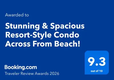 a blue sign with the words springming and spontaneous resort style combo across from at Stunning & Spacious Resort-Style Condo Across From Beach! in Miami Beach