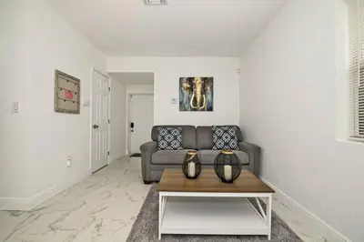 a living room with a couch and a coffee table at Enjoy and relax around Fort Lauderdale area!! in Fort Lauderdale
