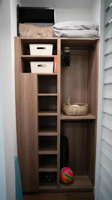 a wooden closet with a bed and a ball in it at Stylish Studio Near Wynwood & Design District in Miami