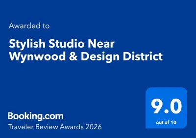 a blue sign with the words swisel studio nearwworf and design district at Stylish Studio Near Wynwood & Design District in Miami