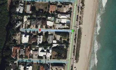an aerial view of a house next to a beach at Steps from the Beach Heated Pool Sun Key Game room RESlDENCES in Fort Lauderdale
