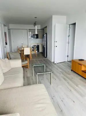 a living room with a couch and a table at Cozy & Comfortable 1BR Apt in Miami Beach 2804A in Hallandale Beach