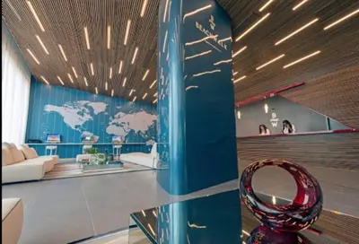a living room with a glass table and a world mural at Miami Beach Luxury Apt, Ocean Views, Full Kitchen -A in Hallandale Beach
