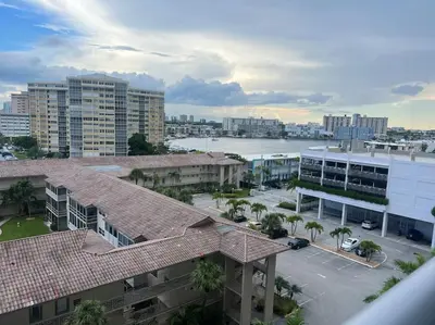 an aerial view of a city with buildings and a harbor at Your Coastal Studio, 2 Full Beds & Ocean Vibes in Hallandale Beach