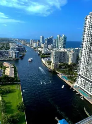 a view of a river in a city with buildings at Stylish BeachWalk Studio, Sleep 4 Comfortably in Hallandale Beach