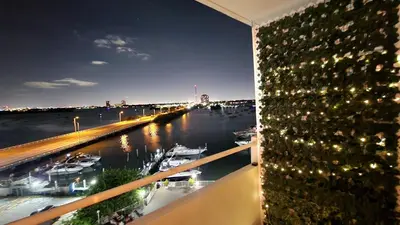 a view of a marina at night from a building at Bayfront Apartment Breathtaking Views- one bedroom w balcony- living room -Free Parking in Miami Beach